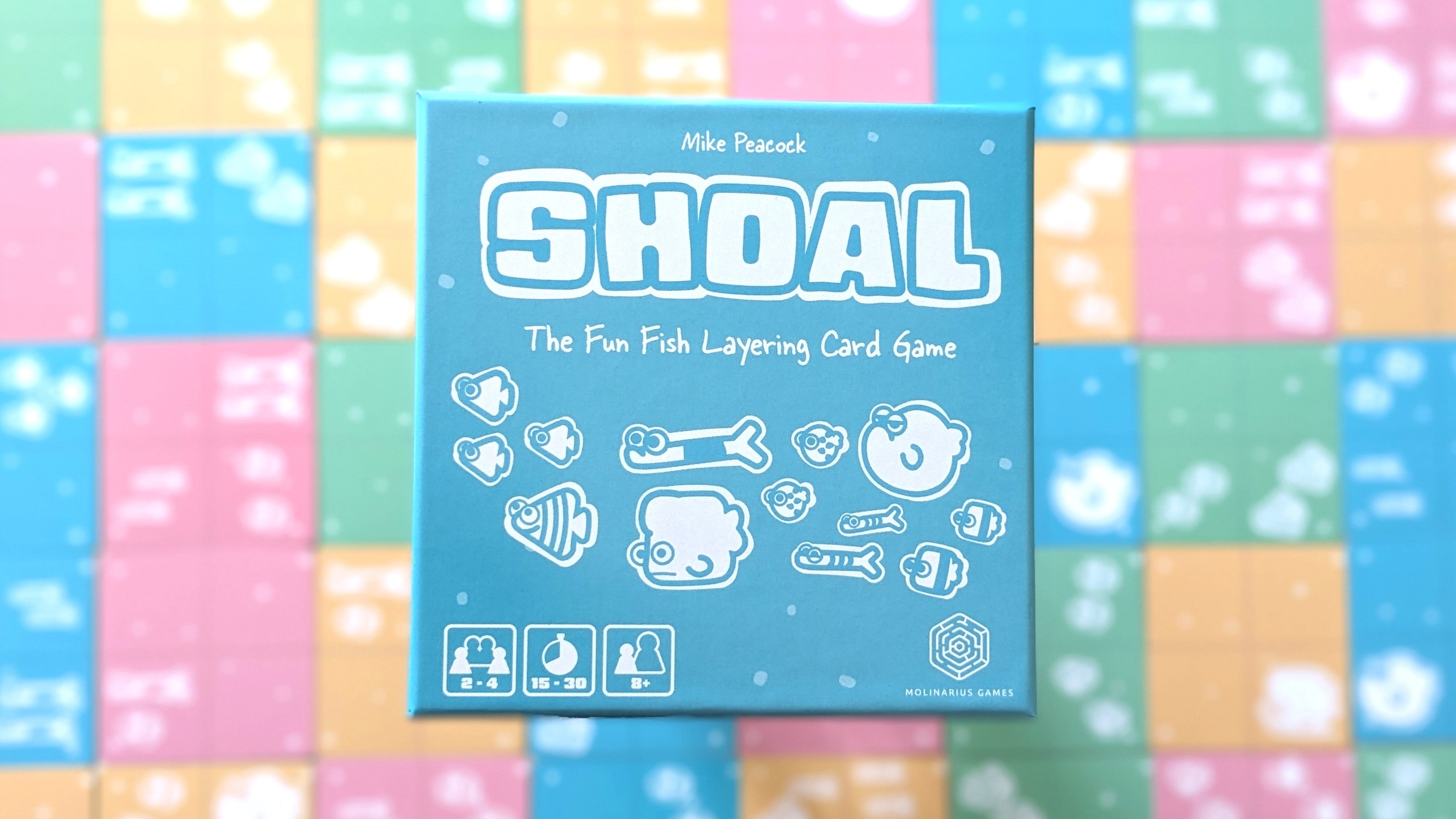 Shoal card game box with colorful background